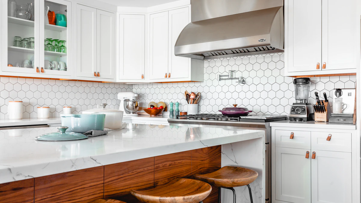 Kitchen with white cabinets and light quartz countertops