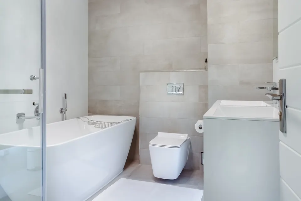 Modern bathroom with freestanding tub and wall-hung vanity